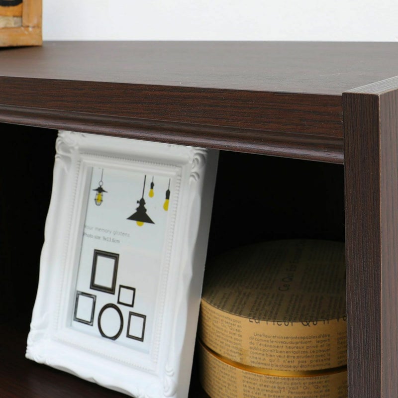 [天板のデザイン]天板にはやわらかく彫り込んだライン。優しい影が表情をつくります。